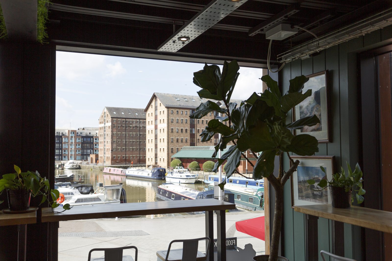Historic dock warehouses viewed from the window of Wholly Gelato.